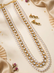 Back view of the adjustable dori of a long white pearl and kundan necklace, shown beside the two round pearl strands that sit along the neckline
