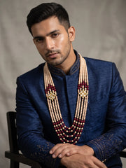 Traditional maroon dulha mala with cascading bead strands, faux pearls and decorative Kundan brooches for pairing with an Indian wedding sherwani.