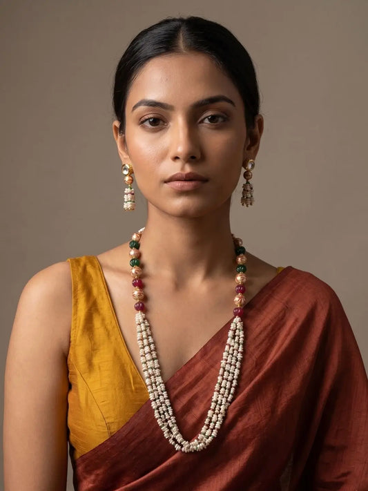 Elegant Freshwater Pearl and Multicolor Kharbuja-Shaped Jade Beaded Necklace Set with Kundan Accents Worn by a Woman