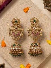 Elephant design temple jhumka earrings in antique gold with Kundan Polki stones, green synthetic gemstones and ornate traditional detailing