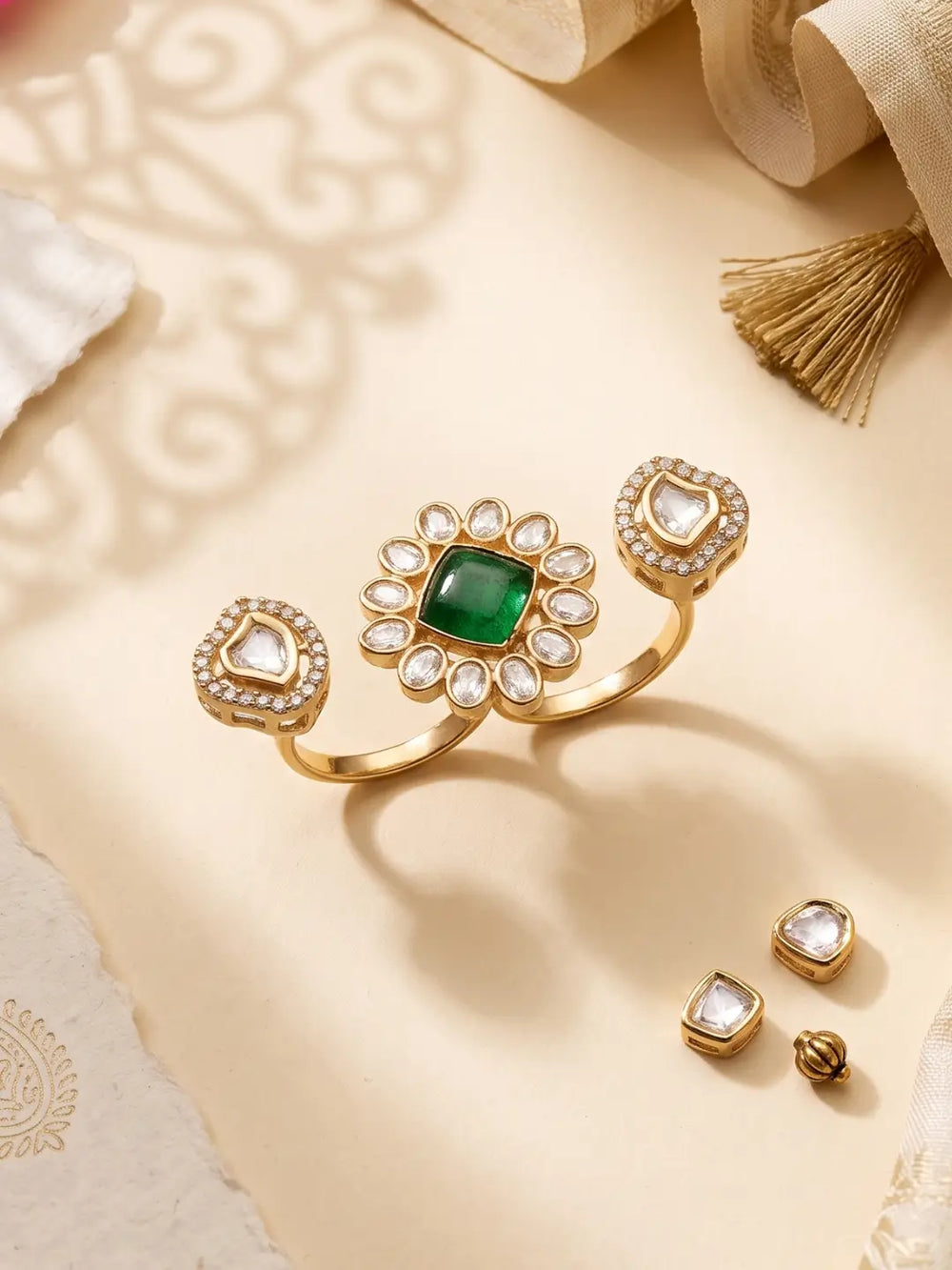 Green gold plated Kundan Polki double finger ring with CZ details, designed as a statement accessory for bridal, wedding and festive outfits.