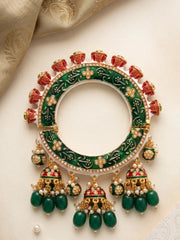 Gold plated green Meenakari Pacheli kada featuring Kundan-style stones, synthetic pearls and hanging bead details for traditional wedding styling.