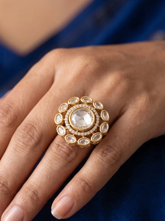 Gold plated Kundan statement ring featuring a floral cluster of Polki stones, CZ accents and a bold silhouette for wedding and festive jewellery looks