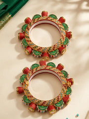 Gold plated multicolour Meenakari Kundan Gokhru bangles featuring red fan motifs, green floral details and pearl-style accents for weddings.