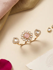 Pink gold plated Kundan Polki double finger ring with CZ details, styled as a statement accessory for bridal and traditional ethnic outfits.