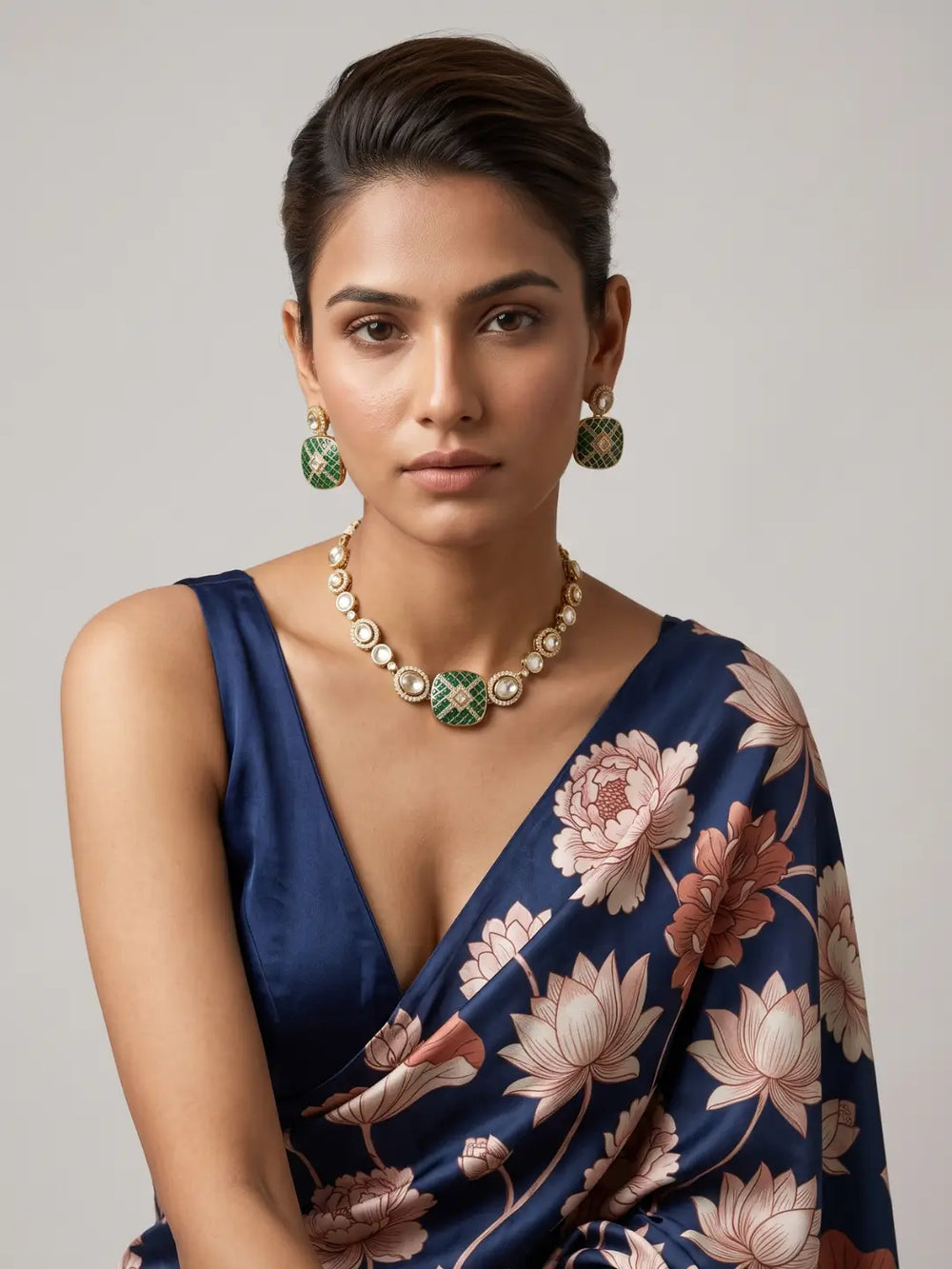 Green gold plated Kundan Polki necklace with graduated stones, enamel detailing and matching earrings for wedding and cocktail styling.