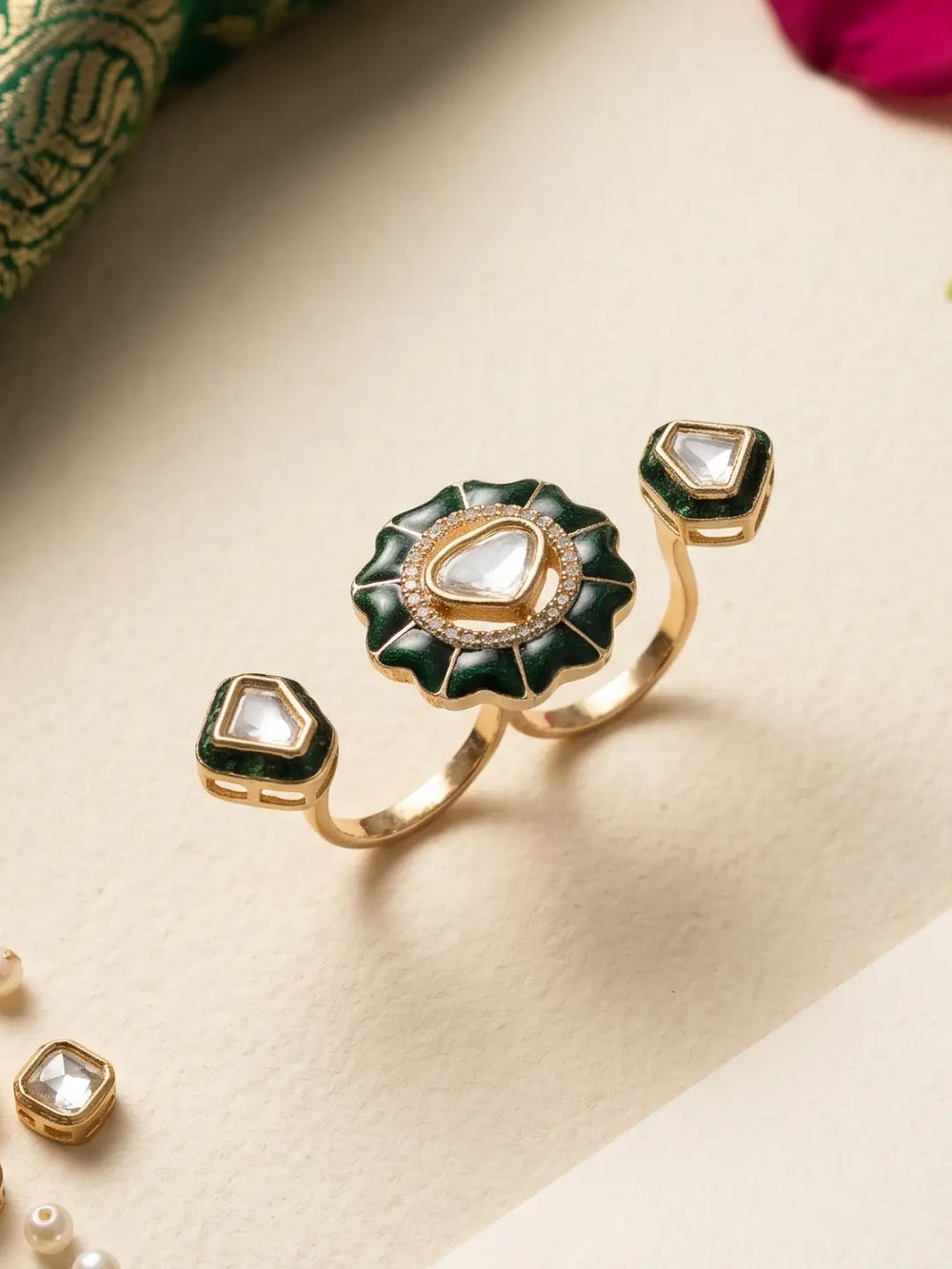 Green Kundan double finger ring for women with gold plating, enamel detail and Polki stones, ideal for bridal, wedding and festive jewelry looks.