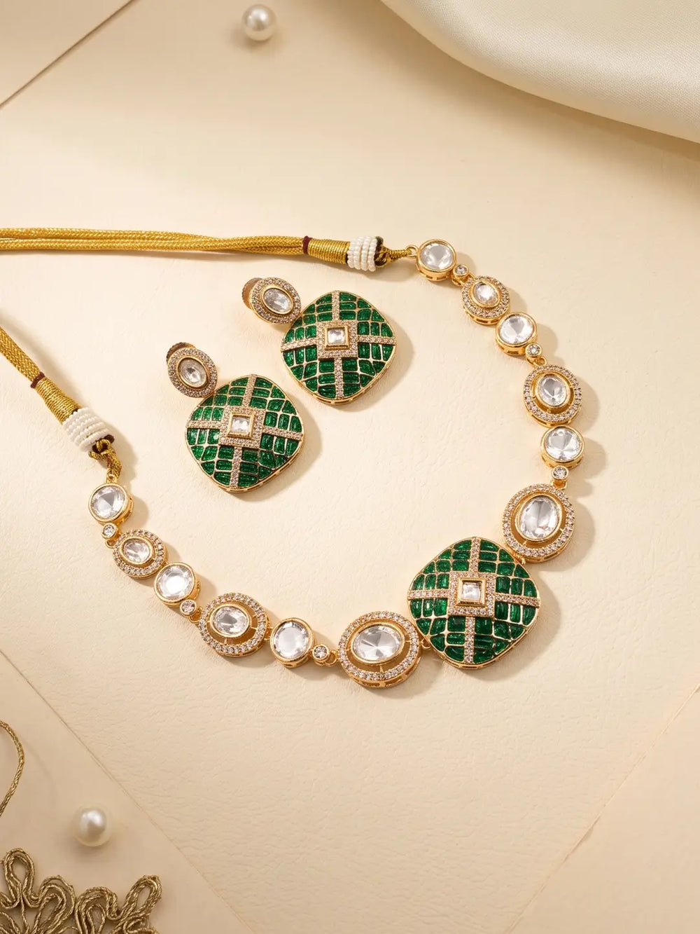 Green Kundan Polki choker-style necklace set with CZ stones, enamel accents and matching earrings for mehendi, sangeet and wedding looks.
