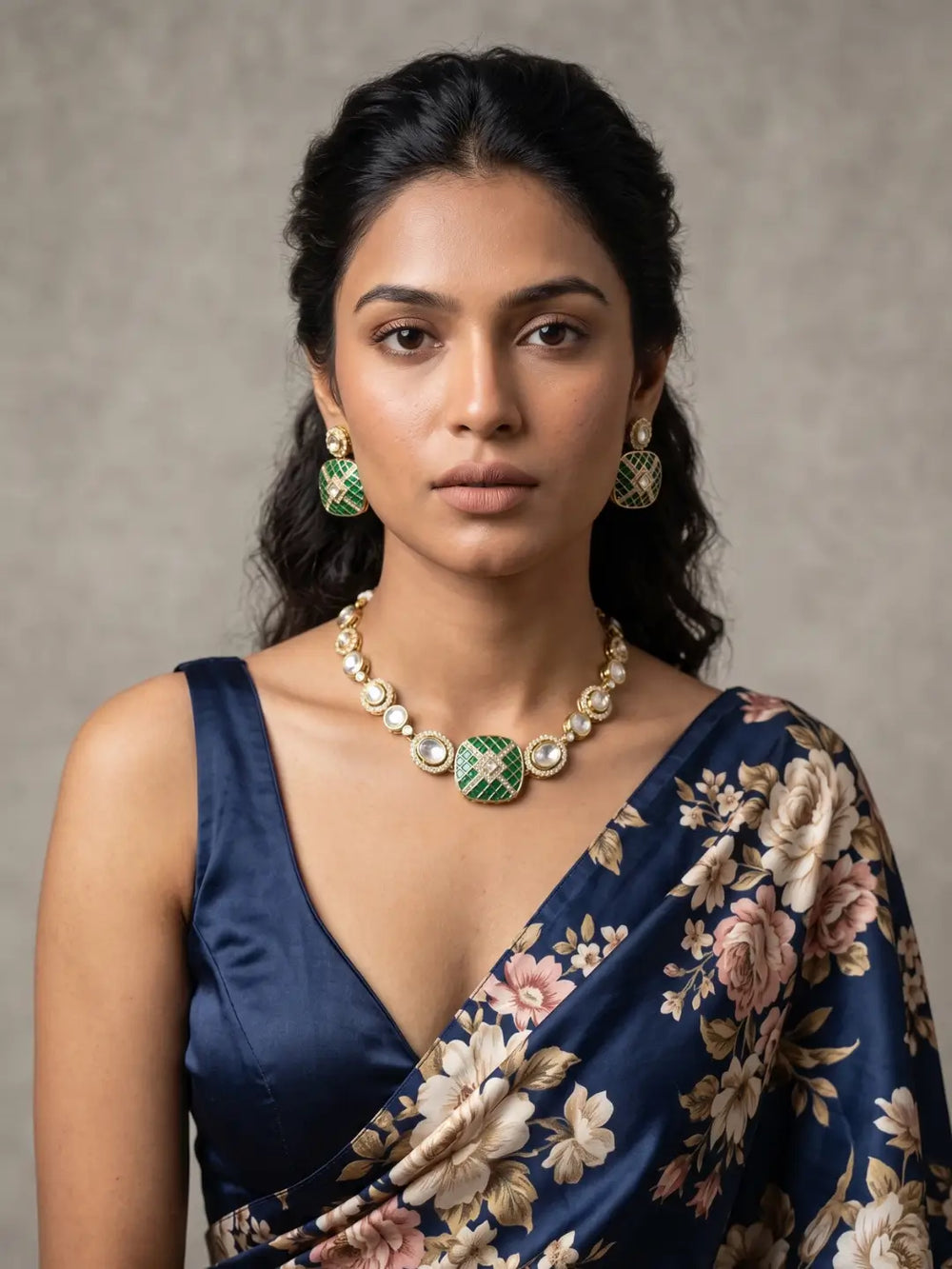 Green Kundan Polki necklace set with green enamel detailing, white stone accents and matching gold-tone earrings for festive styling.