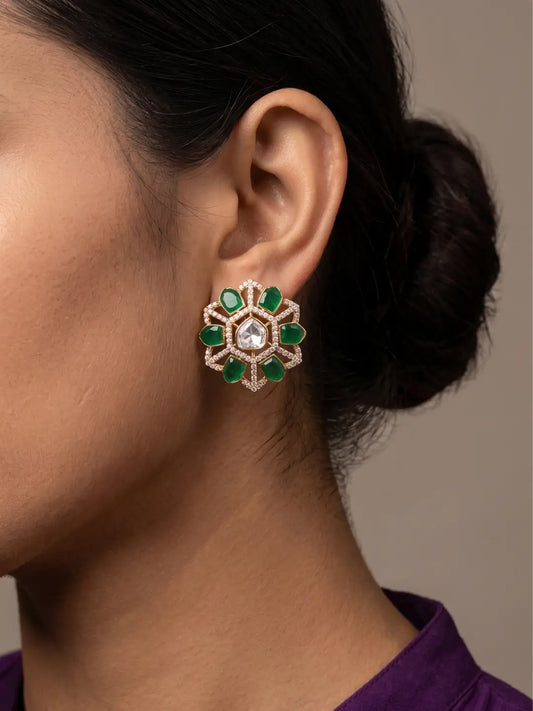 Green uncut Polki stud earrings with prominent centre stone, CZ accents and petal-shaped colour stones in a gold plated floral design