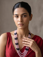 Long blue and pink gemstone beaded necklace with multiple strands, gold-plated detailing and an adjustable dori for wedding and festive styling.