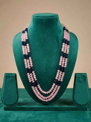 Long pink and blue beaded wedding mala with gemstone beads, shell pearls and gold-plated detailing, designed for ethnic and festive jewellery looks.