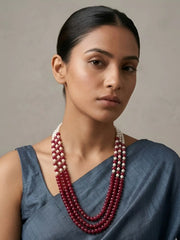 Maroon and green jade beaded mala featuring multiple strands of shell pearls and gold-plated detailing for saree and ethnic jewellery styling