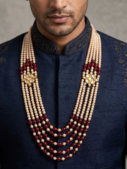 Maroon groom sherwani mala featuring multiple strands of jade beads and faux pearls, connected by ornate gold-plated Kundan-style brooches.