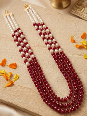 Maroon pearl and jade mala with layered green and red gemstone beads, shell pearls and gold-plated details for sarees, lehengas and weddings.