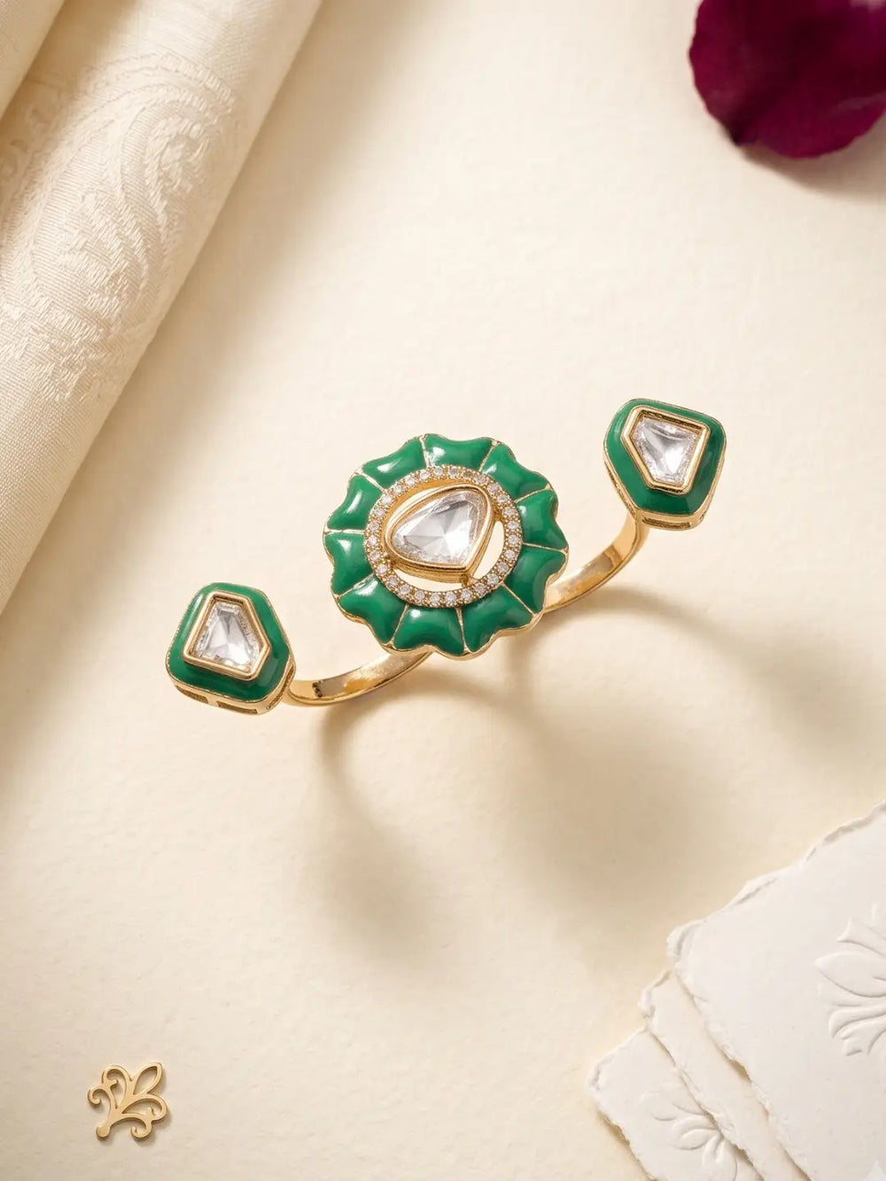 Mint green Kundan double finger ring for women featuring gold plating, enamel detailing and Polki stones for bridal, wedding and festive styling.