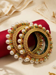 Multicolour gold plated Pearl Pacheli Jadau bangles with pink, green, blue and pearl accents, designed for weddings and festive ethnic outfits.