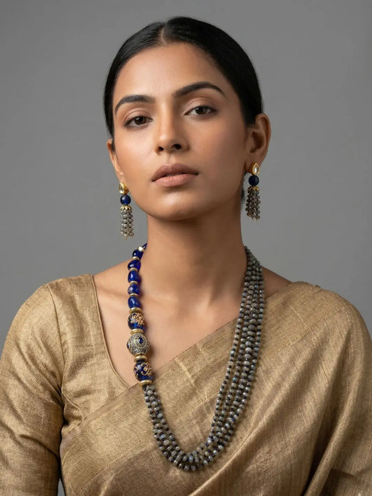 Layered blue jade and natural labradorite bead necklace set with grey faceted stones, blue metallic beads and matching earrings