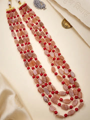 Natural red coral and moonstone beaded necklace with multiple layered strands and gold-plated details for wedding and occasion styling.