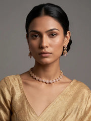 Pink CZ and Polki stone choker necklace set with matching jhumka earrings and gold-tone detailing for Indian wedding jewellery.