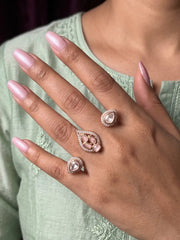 Pink gold plated double finger ring with CZ, Polki-style and colourful stones, designed for bridal, wedding, party wear and festive looks.