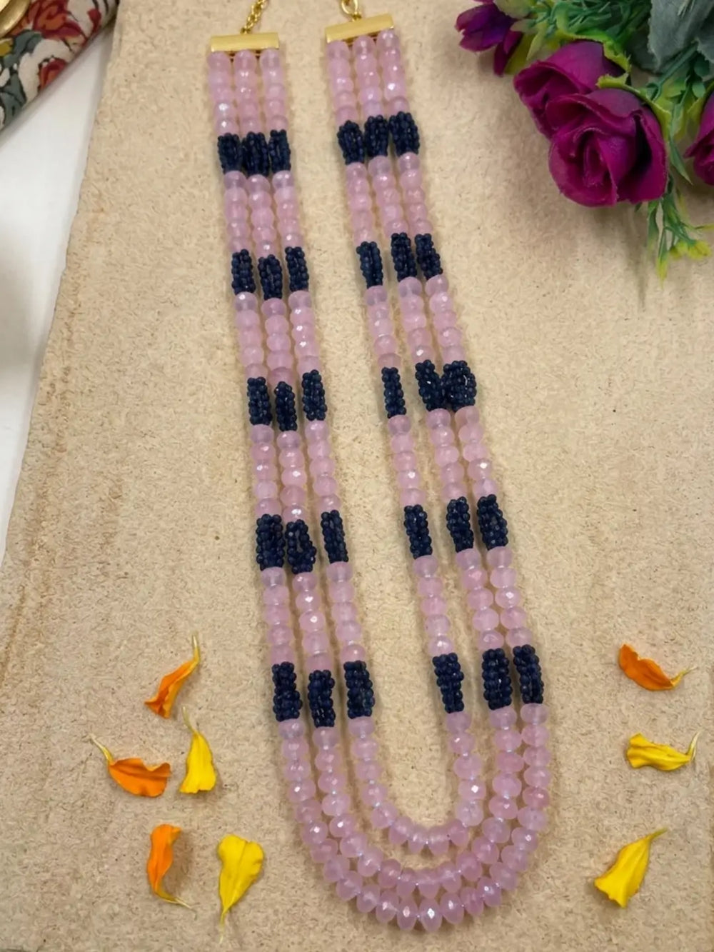 Pink jade and blue beaded mala for women with gold-plated detailing, featuring a layered design for sarees, lehengas and festive outfits.