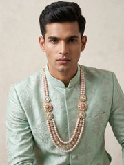 Pink shell pearl Kundan dulha mala with layered beads, ornate Polki brooches and CZ accents, designed for traditional Indian groom sherwanis.