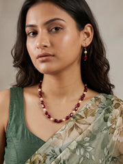 Single-strand red box-shaped jade bead necklace with faux pearls, shown with matching drop earrings and gold-tone accents
