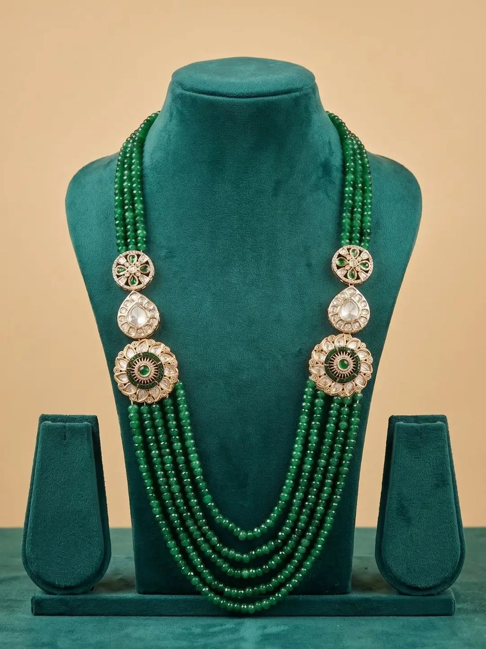 Royal green beaded sherwani necklace with layered jade beads and Kundan Polki brooches, designed for groom wedding and reception outfits.