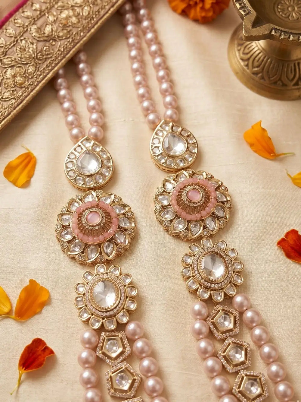 Royal pink pearl sherwani mala for groom featuring layered shell pearls, Kundan-style brooches and CZ stones for traditional Indian wedding wear