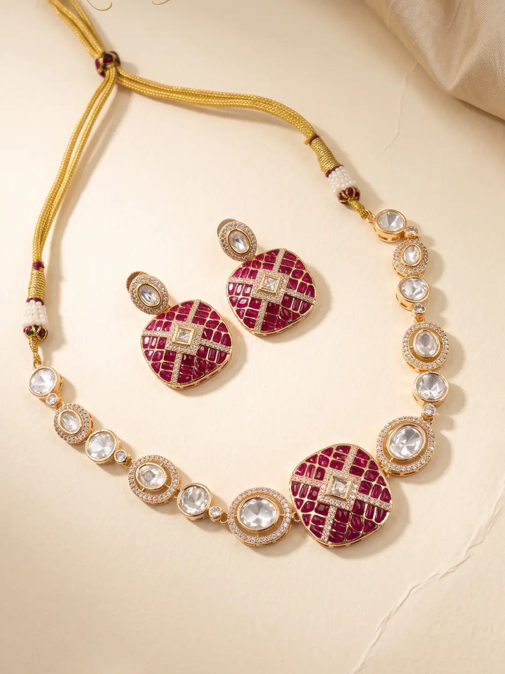 Ruby pink Kundan Polki choker-style necklace set with CZ stones, enamel accents and matching earrings for mehendi, sangeet and wedding looks.