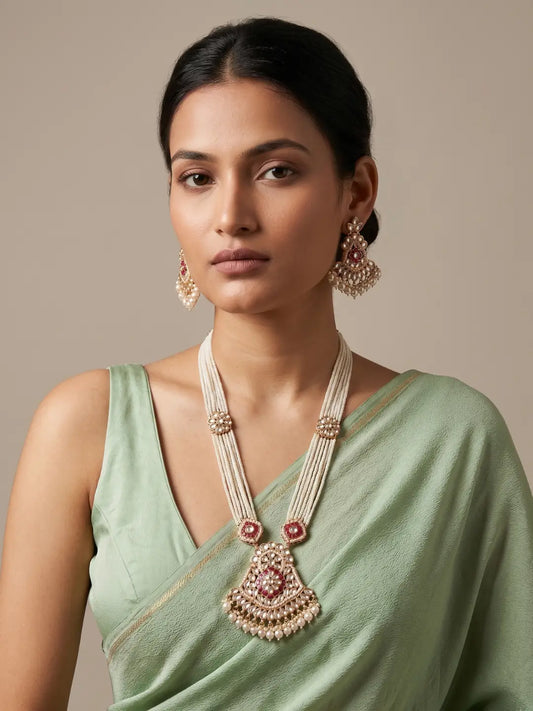 Ruby Pink Long Kundan Necklace Set with Layered Pearl Strands Styled with Traditional Saree