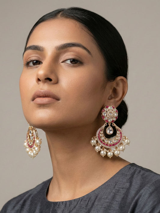 Ruby pink Polki Kundan Chandbali earrings with gold plating, colourful enamel accents, sparkling stones and multiple pearl danglers.