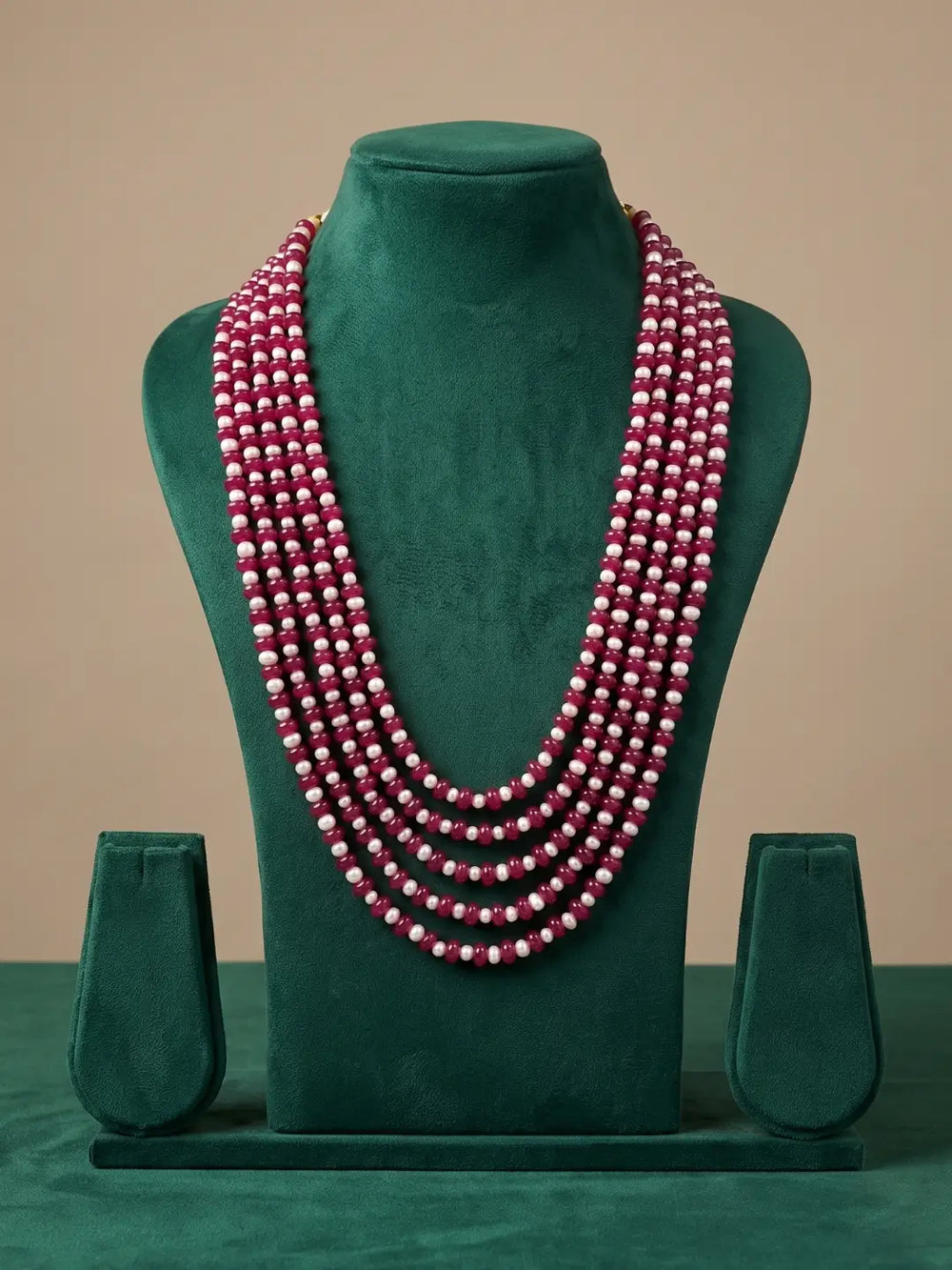 Ruby red jade and natural freshwater pearl mala with layered strands, designed to complement sarees, lehengas, Anarkalis and ethnic outfits.