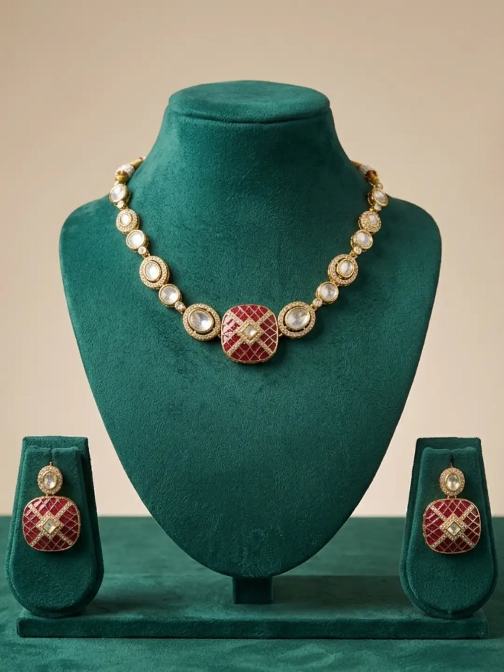 Ruby pink Polki statement necklace set featuring Kundan-style stones, CZ accents and enamel detailing, styled for sarees and lehengas.