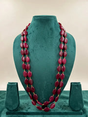 - Red jade bead necklace for groom with two graduated strands and an adjustable dori, suited to sherwanis, kurta sets and traditional Indian outfits.