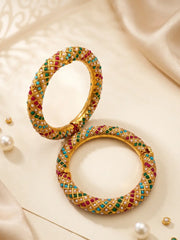 Traditional multicolor Jadau bangles with gold plating, pearl-style details and colorful stones, ideal for sarees, lehengas and festive outfits.