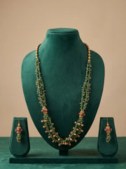 Traditional green beaded necklace set with gold-tone ghungroo accents and ornate detailing, styled for sarees, weddings and festive occasions