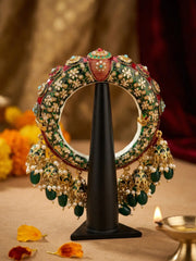 Traditional green Meenakari Kundan kada bangle with floral motifs, stone accents and hanging jhumka details for saree and lehenga styling.