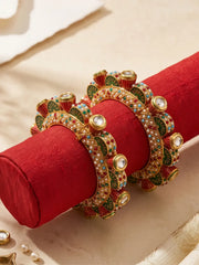 Traditional multicolour Meenakari Kundan Gokhru kada bangles with red and green enamel, gold-tone detailing and pearl accents for ethnic outfits.