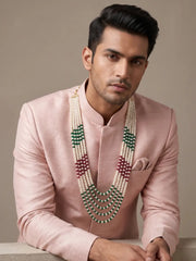 Traditional dulha necklace featuring multiple freshwater pearl strands with green and red jade bead accents and gold plating