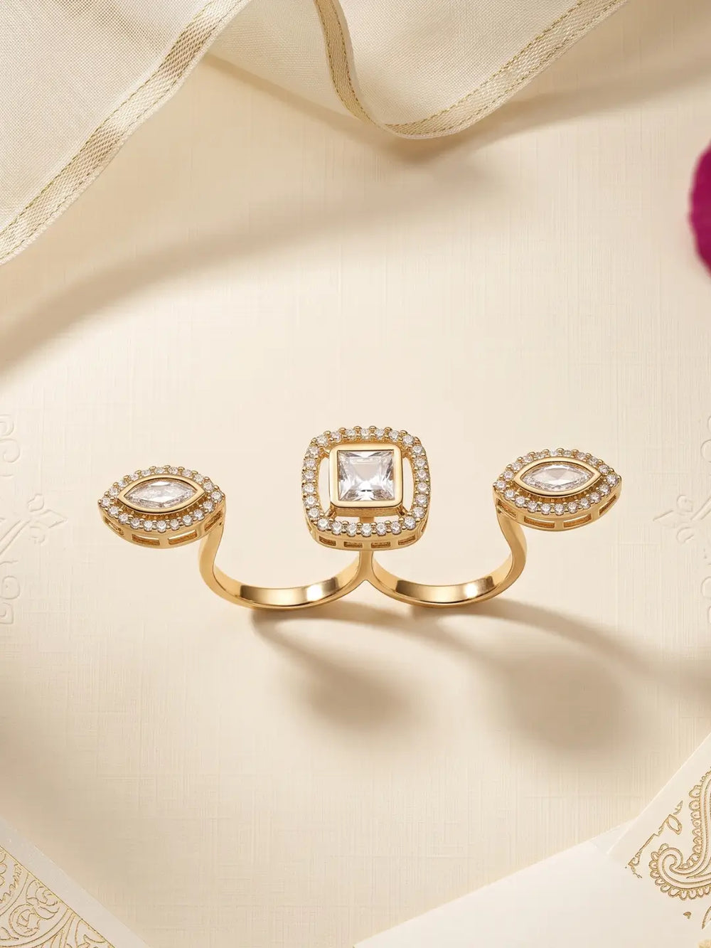 White gold plated square Polki double finger ring with marquise-shaped CZ motifs, styled as a statement accessory for bridal and wedding outfits.