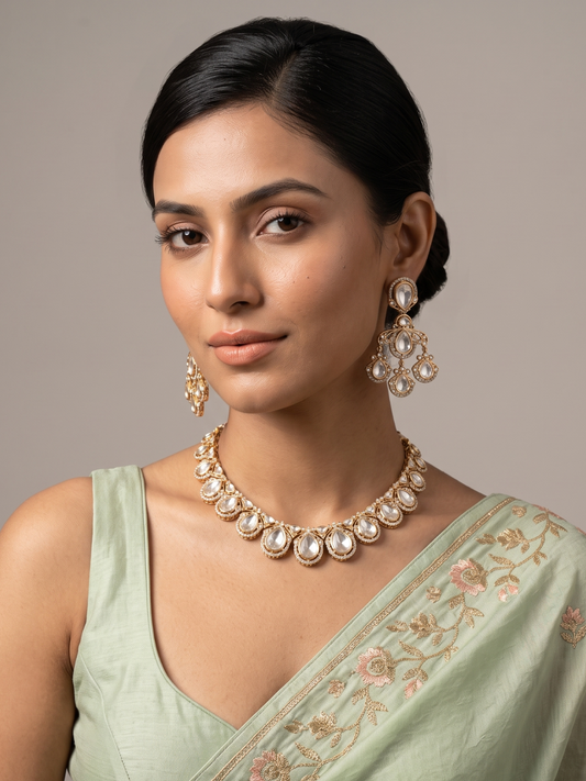 Woman Wearing Exquisite Rose Gold-Tone Polki Teardrop Necklace and Earring Set