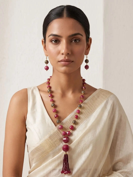 Woman Wearing Exquisite Watermelon-Shaped Red Jade Beaded Necklace with Garnet Tassels