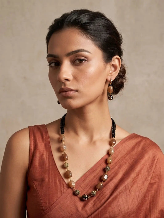 Woman Wearing Handcrafted Black Hydro and Brown Chalcedony Beaded Mala Necklace Set