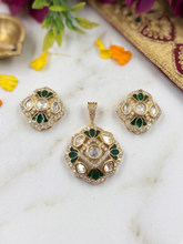 Designer Gold Plated Kundan Pendant And Earring Set with green enamel