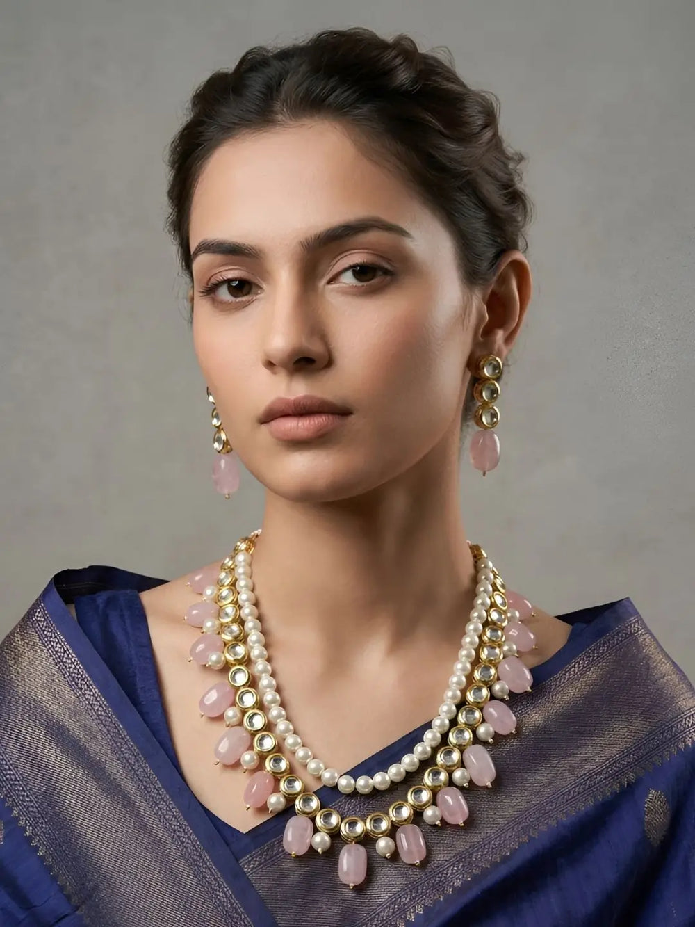 a women wearing a Gold Plated Beaded Pearls, pink stones and Kundan Statement Necklace Set For Women - Indian Ethnic Jewellery
