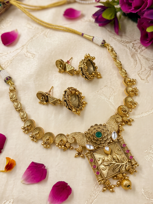 Aaradhya Ethnic Gold Plated Short Antique Jewellery Set With Floral Detailing
