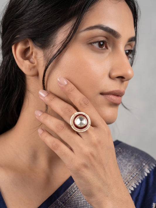 Adjustable gold plated Polki ring with a bold red enamel surround, faceted centre stone, CZ accents and delicate pearl border for festive styling