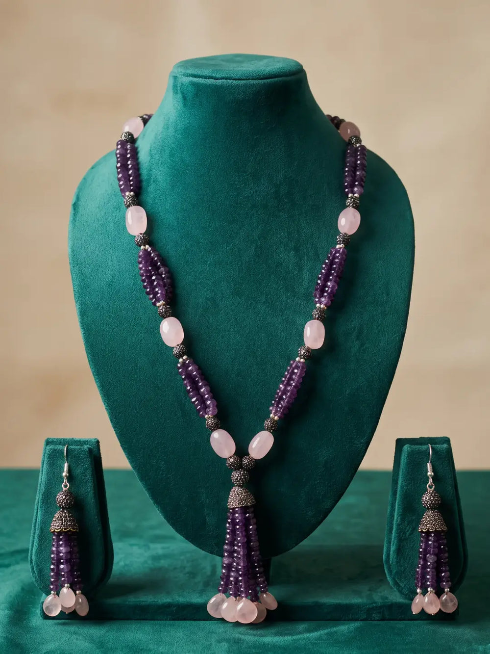 Statement purple and pink tassel necklace with silver-plated detailing, suited to styling with sarees, kurtis, evening dresses and Indo-Western outfits